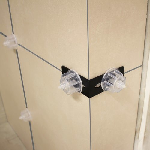 Levelling corners for tile levelling systems, 25 pieces, buy cheap at KARL DAHM
