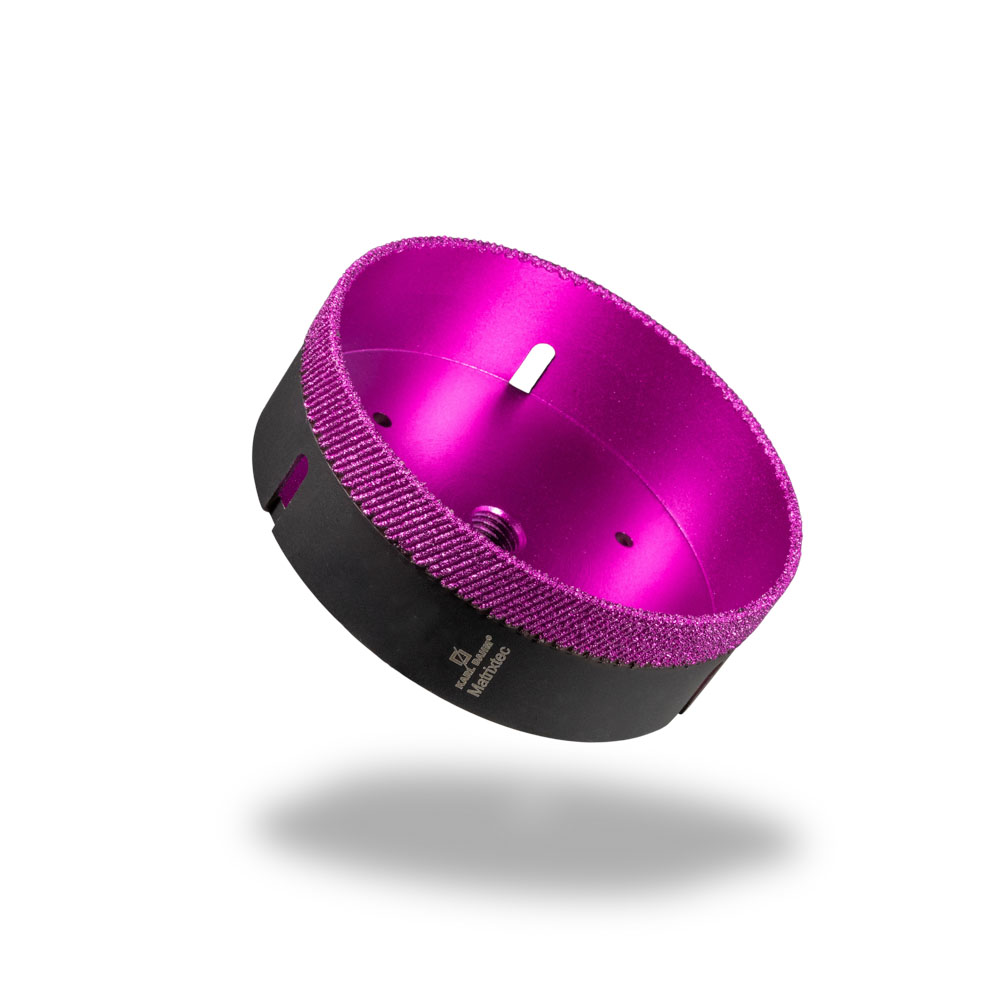120 mm diamond dry core drill bit MATRIXTEC in black with pink diamond coating and angled segmentation.