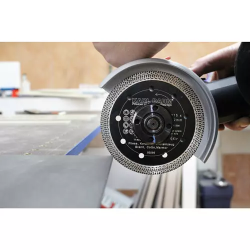 Flex angle grinder with disc in use